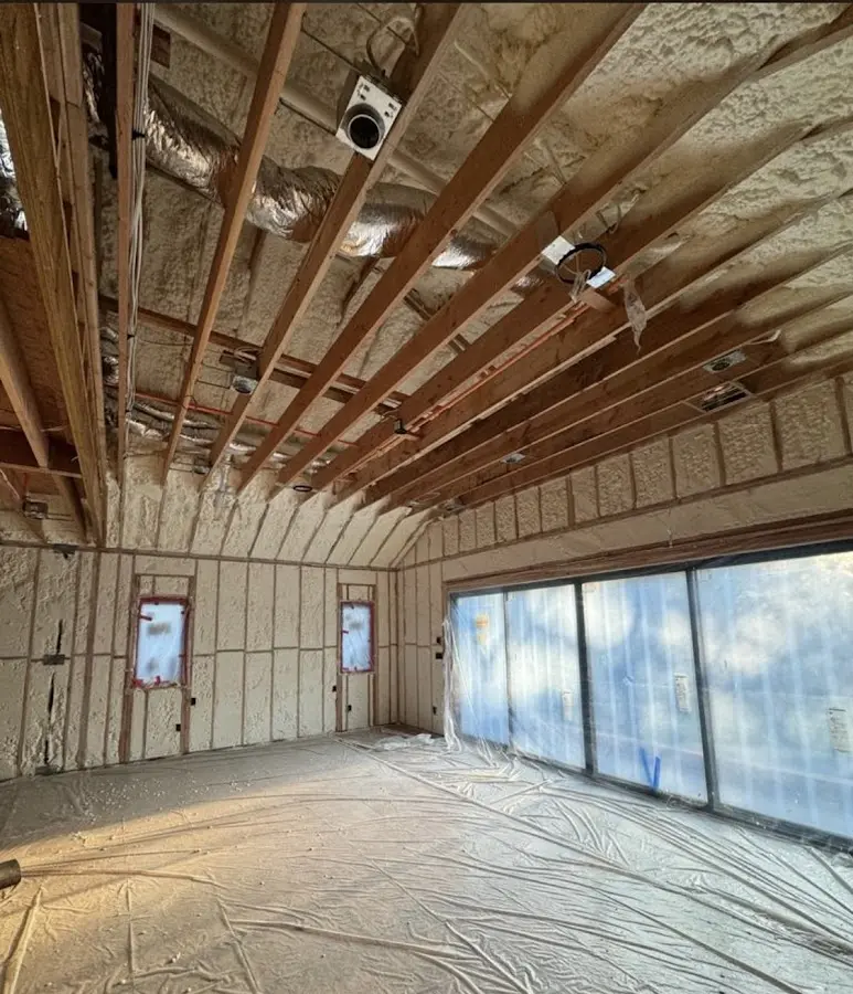 Interior walls and ceiling insulated with spray foam during new construction in Atherton